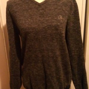 Women's medium Billabong V neck black long sleeve sweater.
